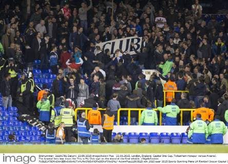 23.09.2015. London, England. Capital One Cup. Tottenham Hotspur versus Arsenal. The Arsenal fans tear down the This is My Club sign on the stand at the final whistle. xNigelxCookex  ActionPlus11663625