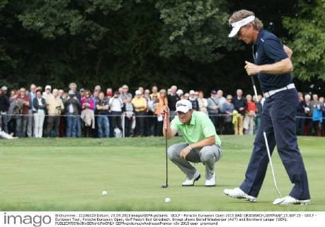 GOLF - Porsche European Open 2015 BAD GRIESBACH,GERMANY,25.SEP.15 - GOLF - European Tour, Porsche European Open, Golf Resort Bad Griesbach. Image shows Bernd Wiesberger (AUT) and Bernhard Langer (GER). GEPAxpictures xAndreasxPranter