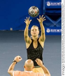 (150925) -- WUHAN, Sept. 25, 2015 -- Maria Sharapova of Russia takes a training ahead of her 2015 WTA Tennis Damen Wuhan Open Tennis tournament match at the center court of Optics Valley International Tennis Center in Wuhan, capital of China s Hubei Province on Sept. 25, 2015.(Xinhua )(wll) (SP)CHINA-WUHAN-TENNIS-WTA-WUHAN OPEN-SHARAPOVA XiaoxYijiu 