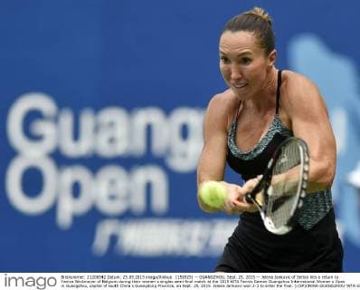 (150925) -- GUANGZHOU, Sept. 25, 2015 -- Jelena Jankovic of Serbia hits a return to Yanina Wickmayer of Belgium during their women s singles semi-final match at the 2015 WTA Tennis Damen Guangzhou International Women s Open in Guangzhou, capital of south China s Guangdong Province, on Sept. 25, 2015. Jelena Jankovic won 2-1 to enter the final. ) (SP)CHINA-GUANGZHOU-WTA-GUANGZHOU OPEN (CN) LiangxXu 