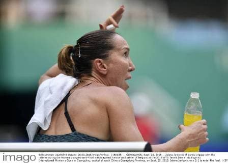 (150925) -- GUANGZHOU, Sept. 25, 2015 -- Jelena Jankovic of Serbia argues with the referee during the women s singles semi-final match against Yanina Wickmayer of Belgium at the 2015 WTA Tennis Damen Guangzhou International Women s Open in Guangzhou, capital of south China s Guangdong Province, on Sept. 25, 2015. Jelena Jankovic won 2-1 to enter the final. ) (SP)CHINA-GUANGZHOU-WTA-GUANGZHOU OPEN (CN) LiangxXu 