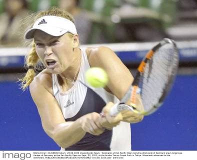 Wozniacki at Pan Pacific Open Caroline Wozniacki of Denmark plays Angelique Kerber of Germany at the Pan Pacific Open on Sept. 25, 2015, at the Ariake Tennis Forest Park in Tokyo. Wozniacki advanced to the semifinals. 