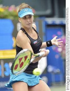 Bencic advances to Tokyo final Switzerland s Belinda Bencic returns a shot against Denmark s Caroline Wozniacki in a semifinal match at the Pan Pacific Open Tennis Tournament in Tokyo on Sept. 26, 2015. Bencic won 6-2, 6-4. 