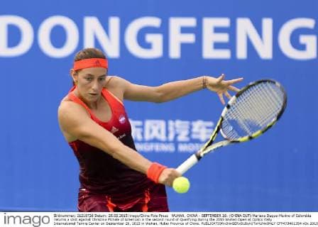 WUHAN, CHINA - SEPTEMBER 26: (CHINA OUT) Mariana Duque-Marino of Colombia returns a shot against Christina Mchale of American in the second round of Qualifying during the 2015 Wuhan Open at Optics Vally International Tennis Center on September 26, 2015 in Wuhan, Hubei Province of China.  CFP473461354 