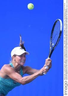 WUHAN, CHINA - SEPTEMBER 26: (CHINA OUT) Yulia Putintseva of Russia returns a shot against Heather Watson of Britain in the second round of Qualifying during the 2015 Wuhan Open at Optics Vally International Tennis Center on September 26, 2015 in Wuhan, Hubei Province of China.  CFP473461321 