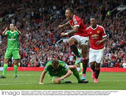 Memphis Depay of Manchester United ManU celebrates scoring the opening goal - Manchester United vs. Sunderland - Barclay s Premier League - Old Trafford - Manchester - 26 09 2015 Pic Philip Oldham SportImage EDITORIAL USE ONLY. No use with unauthorised audio, video, data, fixture lists, club league logos or live services. Online in-match use limited to 120 images, no video emulation. No use in betting, games or single club league player publications.