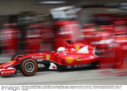Japanese Grand Prix, Suzuka 24 - 27 September 2015 27.09.2015 - Race, Pit stop, Sebastian Vettel (GER) Scuderia Ferrari SF15-T 