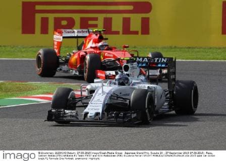 Japanese Grand Prix, Suzuka 24 - 27 September 2015 27.09.2015 - Race, Valtteri Bottas (FIN) Williams F1 Team FW37 and Kimi Raikkonen (FIN) Scuderia Ferrari SF15-T 