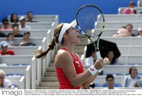 WUHAN, CHINA - SEPTEMBER 27: (CHINA OUT) Johanna Konta of Great Britain celebrates during a match against Andrea Petkovic of Germany in the fist round of 2015 Wuhan Open at Optics Vally International Tennis Center on September 27, 2015 in Wuhan, Hubei Province of China.  CFP473512376 