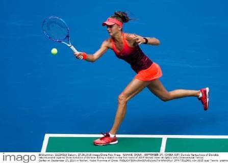 WUHAN, CHINA - SEPTEMBER 27: (CHINA OUT) Daniela Hantuchova of Slovakia returns a shot against Elina Svitolina of Ukraine during a match in the fist round of 2015 Wuhan Open at Optics Vally International Tennis Center on September 27, 2015 in Wuhan, Hubei Province of China.  CFP473512451 