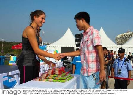 WUHAN, CHINA - SEPTEMBER 27: (CHINA OUT) Varvara Lepchenko of America shakes hands with fans on the first day of 2015 Wuhan Open on September 27, 2015 in Wuhan, Hubei Province of China.  CFP473514648 