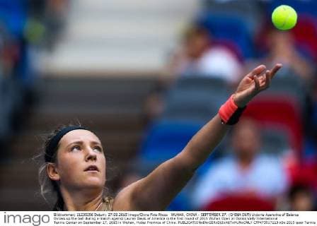 WUHAN, CHINA - SEPTEMBER 27: (CHINA OUT) Victoria Azarenka of Belarus throws up the ball during a match against Lauren Davis of America in the first round of 2015 Wuhan Open at Optics Vally International Tennis Center on September 27, 2015 in Wuhan, Hubei Province of China.  CFP473517113 