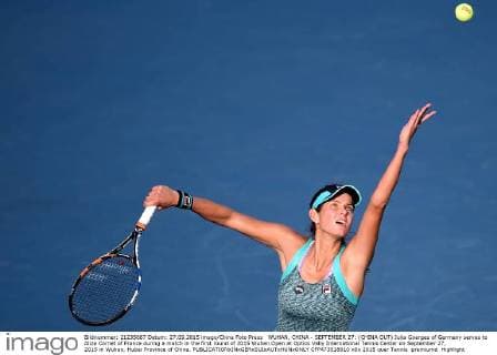WUHAN, CHINA - SEPTEMBER 27: (CHINA OUT) Julia Goerges of Germany serves to Alize Cornet of France during a match in the first round of 2015 Wuhan Open at Optics Vally International Tennis Center on September 27, 2015 in Wuhan, Hubei Province of China.  CFP473518610 