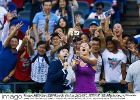 WUHAN, CHINA - SEPTEMBER 27: (CHINA OUT) Victoria Azarenka of Belarus takes selfie with fans after a match in the first round of 2015 Wuhan Open at Optics Vally International Tennis Center on September 27, 2015 in Wuhan, Hubei Province of China.  CFP473518651 