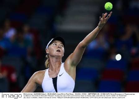 WUHAN, CHINA - SEPTEMBER 28: (CHINA OUT) Maria Sharapova of Russia serves to Barbora Strycova of the Czech Republic during day two of the 2015 Wuhan Open at Optics Vally International Tennis Center on September 28, 2015 in Wuhan, Hubei Province of China.  CFP473572138 