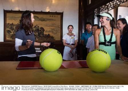 WUHAN, CHINA - SEPTEMBER 28: (CHINA OUT) Retired Chinese tennis star Li Na and Martina Hingis of Switzerland visit the Yellow Grane Tower during day two of the 2015 Wuhan Open on September 28, 2015 in Wuhan, Hubei Province of China.  CFP473573908 