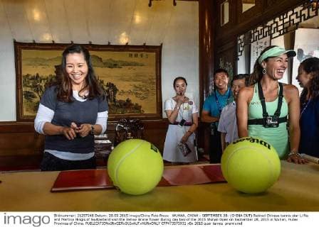 WUHAN, CHINA - SEPTEMBER 28: (CHINA OUT) Retired Chinese tennis star Li Na and Martina Hingis of Switzerland visit the Yellow Grane Tower during day two of the 2015 Wuhan Open on September 28, 2015 in Wuhan, Hubei Province of China.  CFP473573931 