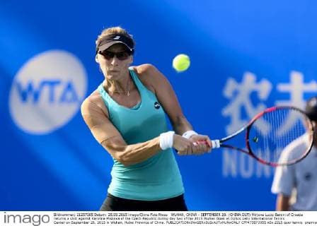 WUHAN, CHINA - SEPTEMBER 28: (CHINA OUT) Mirjana Lucic-Baroni of Croatia returns a shot against Karolina Pliskova of the Czech Republic during day two of the 2015 Wuhan Open at Optics Vally International Tennis Center on September 28, 2015 in Wuhan, Hubei Province of China.  CFP473573955 