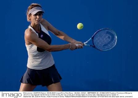 WUHAN, CHINA - SEPTEMBER 28: (CHINA OUT) Tsvetana Pironkova of Bulgaria returns a shot against Camila Giorgi of Italy during day two of the 2015 Wuhan Open at Optics Vally International Tennis Center on September 28, 2015 in Wuhan, Hubei Province of China.  CFP473573973 