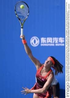 WUHAN, CHINA - SEPTEMBER 28: (CHINA OUT) Mariana Duque-Marino of Columbia serves to Anna Karolina Schmiedlova of Slovakia during day two of the 2015 Wuhan Open at Optics Vally International Tennis Center on September 28, 2015 in Wuhan, Hubei Province of China.  CFP473574247 
