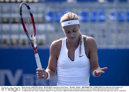 WUHAN, CHINA - SEPTEMBER 28: (CHINA OUT) Anna Karolina Schmiedlova of Slovakia reacts against Mariana Duque-Marino of Columbia during day two of the 2015 Wuhan Open at Optics Vally International Tennis Center on September 28, 2015 in Wuhan, Hubei Province of China.  CFP473574248 