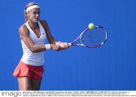 WUHAN, CHINA - SEPTEMBER 28: (CHINA OUT) Anna Karolina Schmiedlova of Slovakia returns a shot against Mariana Duque-Marino of Columbia during day two of the 2015 Wuhan Open at Optics Vally International Tennis Center on September 28, 2015 in Wuhan, Hubei Province of China.  CFP473574250 
