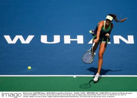 WUHAN, CHINA - SEPTEMBER 28: (CHINA OUT) Ana Ivanovic of Serbia serves to Alexandra Dulgheru of Romania during day two of the 2015 Wuhan Open at Optics Vally International Tennis Center on September 28, 2015 in Wuhan, Hubei Province of China.  CFP473574336 