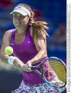WUHAN, CHINA - SEPTEMBER 28: (CHINA OUT) Alexandra Dulgheru of Romania returns a shot against Ana Ivanovic of Serbia during day two of the 2015 Wuhan Open at Optics Vally International Tennis Center on September 28, 2015 in Wuhan, Hubei Province of China.  CFP473574341 