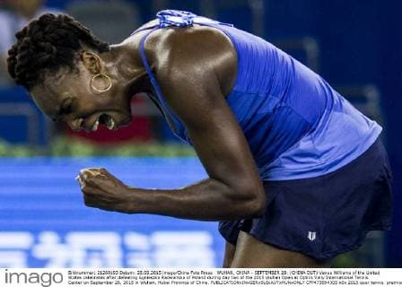 WUHAN, CHINA - SEPTEMBER 28: (CHINA OUT) Venus Williams of the United States celebrates after defeating Agnieszka Radwanska of Poland during day two of the 2015 Wuhan Open at Optics Vally International Tennis Center on September 28, 2015 in Wuhan, Hubei Province of China.  CFP473594305 