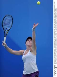 WUHAN, CHINA - SEPTEMBER 29: (CHINA OUT) Madison Brengle of America serves to Ana Ivanovic of Serbia during day three of the 2015 Wuhan Open at Optics Vally International Tennis Center on September 29, 2015 in Wuhan, Hubei Province of China.  CFP473602694 