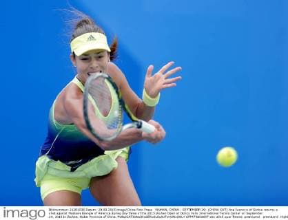 WUHAN, CHINA - SEPTEMBER 29: (CHINA OUT) Ana Ivanovic of Serbia returns a shot against Madison Brengle of America during day three of the 2015 Wuhan Open at Optics Vally International Tennis Center on September 29, 2015 in Wuhan, Hubei Province of China.  CFP473602697 