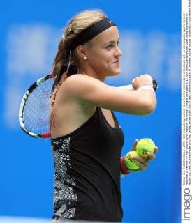 Anna Karolina Schmiedlova of Slovakia reacts as she competes against Caroline Wozniacki of Denmark in their second-round match of the women s singles during the 2015 WTA Tennis Damen Wuhan Open tennis tournament in Wuhan city, central China s Hubei province, 29 September 2015. Fourth seed Caroline Wozniacki of Denmark lost her second round match to unseeded Anna Karolina Schmiedlova of Slovakia 1-2 (6 1, 4 6, 6 7) in a marathon three hour match during the 2015 Wuhan Open on Tuesday (29 September 2015), further thinning out the ranks of the top seed players at the tournament. Fourth seed Wozniacki knocked out from Wuhan Open  20150929_13569