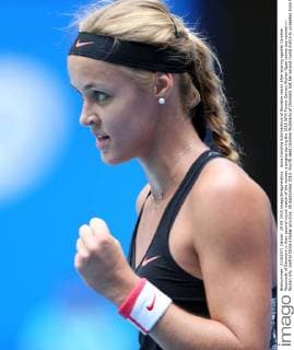 Anna Karolina Schmiedlova of Slovakia reacts after scoring against Caroline Wozniacki of Denmark in their second-round match of the women s singles during the 2015 WTA Tennis Damen Wuhan Open tennis tournament in Wuhan city, central China s Hubei province, 29 September 2015. Fourth seed Caroline Wozniacki of Denmark lost her second round match to unseeded Anna Karolina Schmiedlova of Slovakia 1-2 (6 1, 4 6, 6 7) in a marathon three hour match during the 2015 Wuhan Open on Tuesday (29 September 2015), further thinning out the ranks of the top seed players at the tournament. Fourth seed Wozniacki knocked out from Wuhan Open  20150929_66950