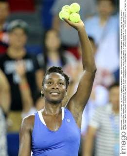 Venus Williams of the United States reacts as she celebrates the 700th victory of her career after defeating Julia Goerges of Germany in their second-round match of the women s singles during the 2015 WTA Tennis Damen Wuhan Open tennis tournament in Wuhan city, central China s Hubei province, 29 September 2015. Venus Williams earned the 700th victory of her career Tuesday (29 September 2015) by beating German qualifier Julia Goerges 6-4, 6-3 in the second round of Wuhan Open. Williams is a seven-time major champion who won her last Grand Slam title at Wimbledon in 2008. Venus Williams wins 700th match of career at Wuhan Open  20150929_67854
