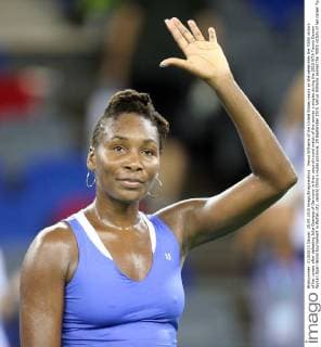 Venus Williams of the United States reacts as she celebrates the 700th victory of her career after defeating Julia Goerges of Germany in their second-round match of the women s singles during the 2015 WTA Tennis Damen Wuhan Open tennis tournament in Wuhan city, central China s Hubei province, 29 September 2015. Venus Williams earned the 700th victory of her career Tuesday (29 September 2015) by beating German qualifier Julia Goerges 6-4, 6-3 in the second round of Wuhan Open. Williams is a seven-time major champion who won her last Grand Slam title at Wimbledon in 2008. Venus Williams wins 700th match of career at Wuhan Open  20150929_35423