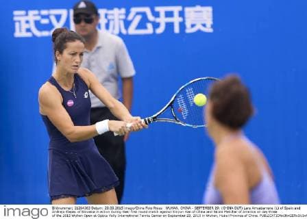 WUHAN, CHINA - SEPTEMBER 29: (CHINA OUT) Lara Arruabarrena (L) of Spain and Andreja Klepac of Slovakia in action during their first round match against Xinyun Han of China and Nicole Melichar of America on day three of the 2015 Wuhan Open at Optics Vally International Tennis Center on September 29, 2015 in Wuhan, Hubei Province of China.  CFP473605056 
