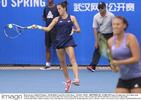 WUHAN, CHINA - SEPTEMBER 29: (CHINA OUT) Lara Arruabarrena (L) of Spain and Andreja Klepac of Slovakia in action during their first round match against Xinyun Han of China and Nicole Melichar of America on day three of the 2015 Wuhan Open at Optics Vally International Tennis Center on September 29, 2015 in Wuhan, Hubei Province of China.  CFP473605062 