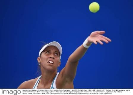 WUHAN, CHINA - SEPTEMBER 29: (CHINA OUT) Madison Keys of America serves to Kristina Mladenovic of France during day three of the 2015 Wuhan Open at Optics Vally International Tennis Center on September 29, 2015 in Wuhan, Hubei Province of China.  CFP473606405 