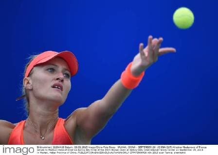 WUHAN, CHINA - SEPTEMBER 29: (CHINA OUT) Kristina Mladenovic of France serves to Madison Keys of America during day three of the 2015 Wuhan Open at Optics Vally International Tennis Center on September 29, 2015 in Wuhan, Hubei Province of China.  CFP473606406 