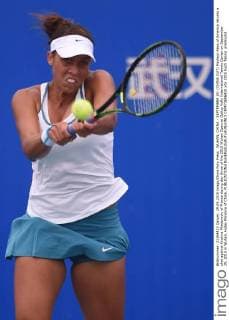 WUHAN, CHINA - SEPTEMBER 29: (CHINA OUT) Madison Keys of America returns a shot against Kristina Mladenovic of France during day three of the 2015 Wuhan Open at Optics Vally International Tennis Center on September 29, 2015 in Wuhan, Hubei Province of China.  CFP473606410 