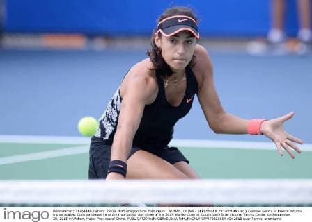 WUHAN, CHINA - SEPTEMBER 29: (CHINA OUT) Caroline Garcia of France returns a shot against Coco Vandeweghe of America during day three of the 2015 Wuhan Open at Optics Vally International Tennis Center on September 29, 2015 in Wuhan, Hubei Province of China.  CFP473610654 