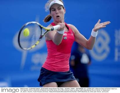 WUHAN, CHINA - SEPTEMBER 29: (CHINA OUT) Johanna Konta of Britain returns a shot against Victoria Azarenka of Belarus during day three of the 2015 Wuhan Open at Optics Vally International Tennis Center on September 29, 2015 in Wuhan, Hubei Province of China.  CFP473610728 