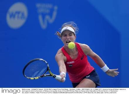 WUHAN, CHINA - SEPTEMBER 29: (CHINA OUT) Johanna Konta of Britain returns a shot against Victoria Azarenka of Belarus during day three of the 2015 Wuhan Open at Optics Vally International Tennis Center on September 29, 2015 in Wuhan, Hubei Province of China.  CFP473610732 