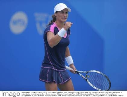 WUHAN, CHINA - SEPTEMBER 29: (CHINA OUT) Monica Niculescu of Romania in action during a match against Carla Suarez Navarro of Spain on day three of the 2015 Wuhan Open at Optics Vally International Tennis Center on September 29, 2015 in Wuhan, Hubei Province of China.  CFP473610914 