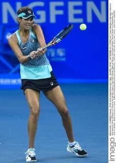 WUHAN, CHINA - SEPTEMBER 29: (CHINA OUT) Julia Goerges of Germany returns a shot against Venus Williams of America during day three of the 2015 Wuhan Open at Optics Vally International Tennis Center on September 29, 2015 in Wuhan, Hubei Province of China.  CFP473617526 