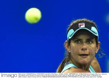 WUHAN, CHINA - SEPTEMBER 29: (CHINA OUT) Julia Goerges of Germany returns a shot against Venus Williams of America during day three of the 2015 Wuhan Open at Optics Vally International Tennis Center on September 29, 2015 in Wuhan, Hubei Province of China.  CFP473617528 