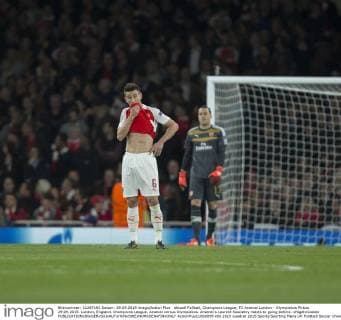 Aktuell FuÃŸball, Champions League, FC Arsenal London - Olympiakos PirÃ¤us 29.09.2015. London, England. Champions League. Arsenal versus Olympiakos. Arsenal s Laurent Koscielny reacts to going behind. xNigelxCookex  ActionPlus11666099
