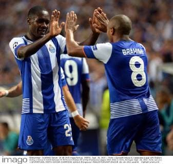 PORTO, Sept. 29, 2015 -- Porto s Giannelli Imbula (L) celebrates a goal with Brahimi during a Group G match between FC Porto and Chelsea FC at the Champions League 2015-2016 in Porto, Portugal, Sept. 29, 2015. Porto won 2-1. ) (SP)PORTUGAL-PORTO-SOCCER-CHAMPIONS LEAGUE ZhangxLiyun 