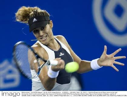 (150930) -- WUHAN, Sept. 30, 2015 -- Garbine Muguruza of Spain returns the ball during the third round match againt Ana Ivanovic of Serbia at 2015 WTA Tennis Damen Wuhan Open Tennis Tournament in Wuhan, capital of central China s Hubei Province, Sept. 30, 2015. Garbine Muguruza won 2-1. ) (SP)CHINA-WUHAN-TENNIS-WTA-WUHAN OPEN (CN) XiaoxYijiu 