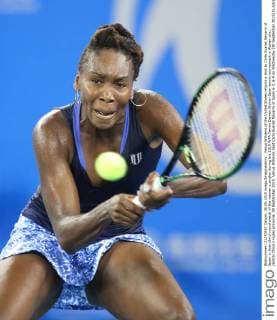 Venus Williams of the United States returns a shot to Carla Suarez Navarro of Spain in their third-round match of the women s singles during the 2015 WTA Tennis Damen Wuhan Open tennis tournament in Wuhan city, central China s Hubei province, 30 September 2015. Venus Williams beat Carla Suarez Navarro of Spain 6-3, 6-4 on Wednesday (30 September 2015) to advance to the quarterfinals of the Wuhan Open. A day after earning her 700th victory, Williams hit five aces and saved three of four break points to dispatch the seventh-seeded Navarro in 1 hour, 29 minutes. Williams, who is a seven-time major champion and won her last Grand Slam title at Wimbledon in 2008, improved to 3-3 in her head-to-head against Navarro. She will next face the winner of the match between top-seeded Simona Halep and Johanna Konta being played later Wednesday. Venus Williams beats Navarro to advance at Wuhan Open  20150930_32080